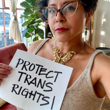 Favi with Protect Trans Rights sign
